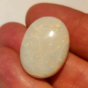 22.90 ct MULTICOLOR SEMI GREY SOLID OPAL   -  AUSTRALIA