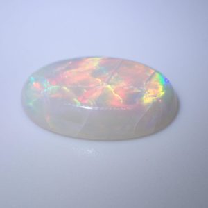 4.43 ct BRIGHT COLOURFUL HARLEQUIN ROLLING FLASH OPAL  -  AUSTRALIA
